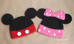 two crocheted mickey and minnie mouse hats on top of each other, one is pink and the other is black with white polka dots