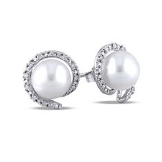 A mesmerizing look, these pearl and diamond earrings transition perfectly from day into evening. Fashioned in 10K white gold, each clever earring features a luminous 8.0-8.5mm cultured freshwater pearl center stone surrounded by a sculpted ribbon lined with shimmering diamonds. Captivating with 1/10 ct. t.w. of diamonds and a brilliant buffed luster, these post earrings secure comfortably with friction backs. Diamond White Pearl Earrings With Diamond Accents For Anniversary, Anniversary Pearl Earrings With Diamond Accents, White Gold Pearl Earrings With Halo Design For Anniversary, Anniversary White Gold Pearl Earrings With Halo Design, Sterling Silver Pearl Earrings With Diamond Accents For Anniversary, Sterling Silver Pearl Earrings With Diamond Accents, Sterling Silver Round Cut Pearl Earrings With Diamond Accents, Zales Jewelry, Diamond Frame