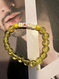 Yellow bracelet with Zayn Malik's name on it Zayn Malik Bracelets, Yellow Bracelet, Friendship Bracelets, Beauty Book, Jewelry Bracelets, Etsy Accessories, Accessory Gift, Beaded Bracelets, Gift Card