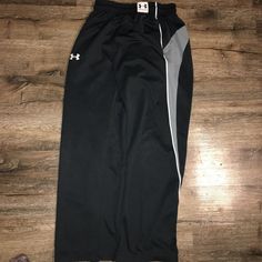 UNDER ARMOUR Joggers Adult SMALL PERFORMANCE Sweatpants Black Zip up Leg Bottoms. Sportswear Bottoms With Pockets For Sports Events, Black Sportswear Pants For Sports Events, Under Armour Casual Streetwear Pants, Sporty Under Armour Sweatpants With Pockets, Black Casual Pants For Sports Events, Under Armour Bottoms With Pockets For Streetwear, Under Armour Black Sweatpants For Sports, Under Armour Streetwear Bottoms With Pockets, Under Armour Sporty Sweatpants For Sports