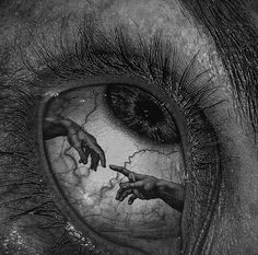 an eye with two hands reaching out to touch the other's eye, in black and white