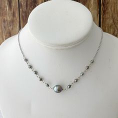 "Looking for something unique and different? This beautiful necklace displays a nice and small Tahitian Pearl paired with small and dainty tahitian keshis pearls . ✨This Listing is for Sterling Silver. For the Gold-filled necklace is click on the following link: Length : 17-18\" if you need a different size please specify at checkout . There is an extender on the back to make it more versatile and can be adjusted slightly about 1\" . Description ✨Tahitian pearls: Size : 8-9mm small and dainty si Tahitian Pearl Drop Necklace As Gift, Tahitian Pearl Drop Necklace For Gift, Handmade Tahitian Pearl Necklace Gift, Tahitian Pearl Briolette Necklace For Gifts, Elegant Handmade Tahitian Pearl Necklace, Silver Tahitian Pearl Necklace With Pearl Drop, Tahitian Pearl Drop Necklace For Wedding, Silver Single Strand Tahitian Pearl Necklace, Silver Tahitian Pearl Necklace With Pearl Charm