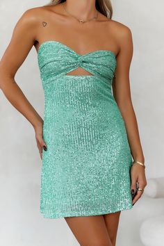 Length from bust to hem of size S: 61cm Chest 32cm, Waist 29cm, size S. Mini dress. Lined. Model is a standard XS and is wearing size XS. True to size. Slight-stretch. Cutout. Twist. Sequins. Cold hand wash only. Polyester/Spandex. Be that girl in the Sparkles Flying Sequins Mini Dress. Featuring a front twist and sequins that'll shine bright all night long. Style with heels for your best look yet. Green Evening Gowns, Cute Formal Dresses, Sequin Homecoming Dress, Cute Homecoming Dresses, Dress Sage, Hoco Dress, Sequin Prom Dresses, Short Homecoming Dress, Green Sequins