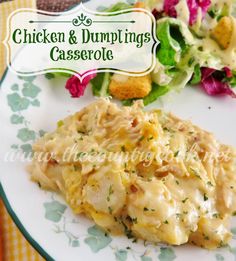 chicken and dumplings casserole on a plate with lettuce