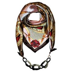 DESCRIPTION Add a glamour statement to your everyday look with one of a kind handmade BellaLunas Jewelry Scarf. A fusion of soft silky satin, handcrafted buffalo horn chain and gold plated hardware full of crystals will instantly put you in the spotlight. From business casual to everyday wear, don’t just wear a jewelry scarf, flaunt it. This show stopping jewelry scarf will add a statement to any outfit. With adjustable length, it can be worn long or short. Visit the BELLALUNAS style guide to vi La Jewelry, Necklace Scarf, Silk Jewelry, Horn Necklace, Versatile Jewelry, Scarf Silk, Ooh La La, Bandana Scarf, Handcrafted Accessories