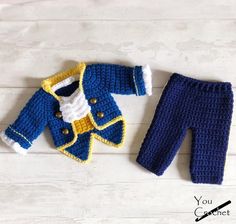 a crocheted blue and yellow jacket and pants