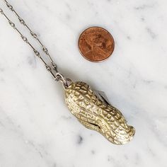 Vintage 1.5" long brass peanut pocket knife hanging from a silver plated bar chain. Pocket Knife Necklace, Knife Necklace, Vintage Necklace, Pocket Knife, Silver Plate, Peanut, Silver Plated, Plating, Brass