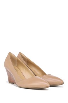 An elegant pointed-toe silhouette sits atop a comfortable stacked wedge heel that pairs easily with both casual or more styled-up outfits. 2 1/2" heel Stacked wedge heel Leather upper/synthetic lining and sole Imported Formal Medium Width Wedge Heels, Workwear Wedge Heels With Padded Heel, Workwear Padded Wedge Heels, Spring Workwear Wedge Heels, Casual Office Wedge Heels, Wedge Heels With Stacked Sole For Work, Formal Wedge Sandals Medium Width, Wedge Heels With Stacked Heel For Work, Stacked Wedge Heels For Work