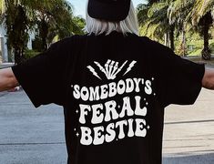 "The perfect Feral Bestie Graphic TShirt is yours!  ✦ QUICK FACTS ✦ Comfort Colors® C1717 T-Shirt is 100% ringspun cotton (ringspun=comfort) Preshrunk, soft washed, garment-dyed fabric Twill-taped back neck and shoulders ✦ SIZING TIPS ✦ All our garments are UNISEX.  FOR AN OVERSIZED LOOK, SIZE UP 2-3 SIZES For a Relaxed Fit order your Usual Size For a Snug Fit order 1 Size down If you're unsure: Lay your favorite fitting T-Shirt flat and *measure armpit to armpit (1\" under armpit) for width *measure from point where neck seam meets shoulder all the way to bottom for length & compare with measurements in Size Chart provided in each listing *Please note, Size Chart Measurements are to be used as guidelines and measurements may vary within a +/- 1\" tolerance ✦ CARE ✦ Turn garment inside out Matching Bestie Shirts, Bestie Shirt Ideas, Bff Birthday Gifts, Funny Best Friend Shirts For 2, Bestie Shirts Funny, Besties Shirts, Warrior Of Light, Star Seed, Light Worker