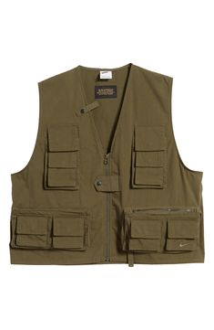 Plenty of pockets help you tackle any adventure in this fishing-inspired vest crafted from comfy cotton twill with rod and net loops throughout. 22 1/2" length (size medium) Exposed front-zip closure V-neck Front snap-flap bellows pockets; front zip pockets; back zip pocket 74% cotton, 26% nylon Machine wash, line dry Imported Nordstrom x Nike: A curated lifestyle destination where fashion is the ultimate sport part lined Khaki Utility Jacket With Pockets For Hiking, Functional Hiking Utility Jacket With Pockets, Khaki Utility Vest With Pockets, Functional Utility Jacket With Pockets For Hiking, Khaki Utility Jacket For Hiking, Khaki Utility Vest With Patch Pockets, Utility Style Khaki Vest With Patch Pockets, Utility Jacket With Multiple Pockets For Outdoor Activities, Utility Jacket With Pockets For Hiking