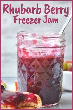 a jar filled with blueberry freeze jam on top of a table