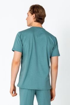 The Lightweight Cotton T-shirt offers the perfect blend of comfort, style, and versatility. Crafted from high-quality cotton fabric, this t-shirt is exceptionally soft and breathable, making it ideal for everyday wear. Its lightweight construction ensures that you stay cool and comfortable throughout the day, whether you're running errands, hitting the gym, or lounging at home. The cotton material is gentle on the skin and helps wick away moisture, keeping you feeling fresh and dry in any situation. With its classic crew neckline and short sleeves, this t-shirt provides a timeless and versatile look that pairs effortlessly with jeans, shorts, or joggers. Whether you prefer a casual or sporty style, the Lightweight Cotton T-shirt is the perfect foundation for creating a variety of outfits. Casual Green T-shirt For Everyday, Basic Green Everyday T-shirt, Basic Green Cotton T-shirt, Green Crew Neck Cotton Shirt, Green Cotton Crew Neck Shirt, Green Cotton Crew Neck T-shirt, Green Casual Cotton T-shirt, Green Relaxed Fit T-shirt, Green Relaxed Fit Comfortable T-shirt