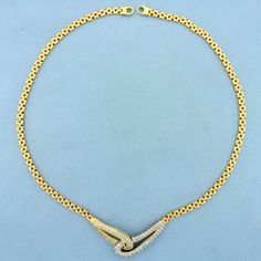 In 14K Yellow Gold. Contains nineteen round and forty baguette diamonds, 2ct TW,VS clarity/H color . 20 inches long, Panther link is 4.4mm wide, diamond pendant part is 2 inches long. 25.8g. Inventory 13755 Herringbone Necklace, Bypass Ring, Baguette Diamonds, Baguette Diamond, Link Necklace, Diamond Pendant, Beautiful Necklaces, Panther, Gold Necklace