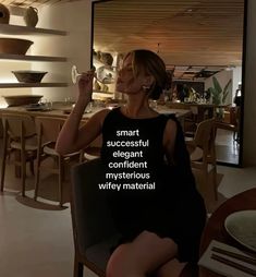 a woman sitting in a chair drinking from a wine glass with the words smart, successful, elegant, confident, mysterious, and very material