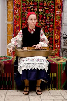 Russian girl with Dagestan carpets Carpet