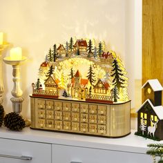 Descriptions: Decorate a holiday table with this 24 days of Christmas advent calendar by HOMCOM. A practical decoration put notes and candies in the little drawers and allow your children to open a single drawer daily. Desk Fireplace, Advent Calendar House, Calendar Wood, Light Up Table, Reusable Advent Calendar, Christmas Village Sets, Wooden Advent Calendar, Village Christmas, Advent Calendars For Kids