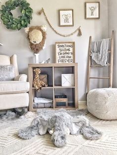 a baby's room with stuffed animals and toys on the floor in front of a bookshelf