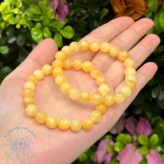 "Honey Calcite Beaded Bracelet Yellow Gemstone Stone Stretch Bracelet Meditation Yoga Bracelet Crystal Gift for Mom Friends Everyday Wear Material : Honey Calcite, Gemstone Stones, Natural Crystal, Raw Stone Quality: AAA+ Length: fit for 6.3 ~ 7.3 inches wrists Beads size: 8mm Your bracelet will arrive beautifully packaged in a gift bag ,The bracelet is made on non fray stretch nylon cord for strength and flexibility. All beads are carefully selected. When you put on and off your bracelet \"roll\" it on instead of stretching to avoid putting stress on the elastic. This will keep the high quality elastic in better condition for a longer time. It is a unique and meaningful gift for yourself or someone special. Perfect cool gift that anyone will love! These happy bracelet can't help but make Amber Gemstone Beaded Bracelets With Round Beads, Amber Beaded Bracelets With Polished Beads As Gift, Amber Beaded Bracelets As Gift, Amber Beaded Bracelets For Gift, Amber Hand-strung Bracelets With Round Beads, Amber Hand-strung Round Beaded Bracelets, Amber Gemstone Beads Bracelet, Yellow Gemstone Beads Crystal Bracelet, Yellow Crystal Healing Bracelet With Round Beads