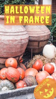 pumpkins and gourds with the words halloween in france above them on display