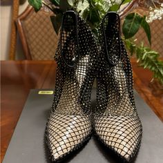 Vince Camuto Women’s Black With Gold Crystal Mesh Bootie Ankle Boot Very Good And Brand New Includes Original Box. So A Stretch Mesh Bootie With Rhinestone Sparkle, Detail, And Metal Cigarette Heel Elegant, And Sexy. Party Boots With Wrapped Heel And Closed Toe, Wrapped Heel Ankle Boot Heels For Night Out, Glamorous Ankle Boot Heels With Reinforced Heel, Black Glamorous Boots With 4-inch Heel, Glamorous Ankle Boots With Reinforced Heel, Evening Ankle-high Heels With Reinforced Heel, Glamorous Black Boots With 4-inch Heel, Ankle-high Heels With Reinforced Heel For Evening, Glamorous Ankle-high Leather Heels