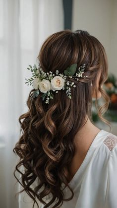 a woman with long hair and flowers in her hair