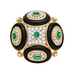 The pin is finely crafted in 18k yellow gold with diamonds weighing approximately total of 7.00 carat and emerald weighing approximately total of 5.00 carat and onyx. Jewellery Board, High Jewellery, Onyx Jewelry, Jewelry Boards, Jewelry Pins, Gold Brooches, Emerald Jewelry, Emerald Diamond, High Jewelry