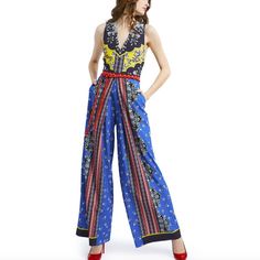 Fits True To Size, Take Your Normal Size O V-Neck O Sleeveless O Tie Waist O Exposed Back Zipper Closure O 100% Polyester Est. Retail Price: $595.00 Chic Blue Wide-leg Jumpsuits And Rompers, Chic Blue Wide Leg Jumpsuits And Rompers, Sleeveless Blue Pantsuit For Summer, Chic Blue V-neck Pantsuit, Chic Multicolor Jumpsuits And Rompers, Chic Multicolor Workwear Jumpsuits And Rompers, Chic Multicolor Jumpsuits And Rompers For Work, Multicolor Jumpsuits And Rompers For Spring Workwear, Black Strapless Jumpsuit