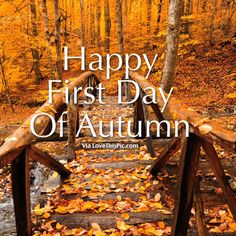 a wooden bridge with leaves on it and the words, happy first day of autumn