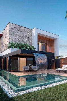 a house with a pool in front of it