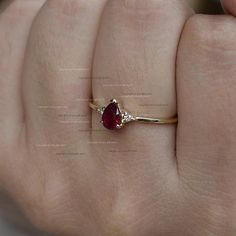 Description Wedding Ruby Gemstone Ring in real SI Clarity G-H color Diamonds Ring . ≫ Features * Items Code: LSGR00772 * Metal: 14K Solid Gold (18K also available - Additional fees may apply) * Solid 14K Yellow Gold with stamped * More option in gold color: Rose gold, yellow gold, White gold * Diamonds Wt :- 0.04 ct * Diamond color :- G-H * Diamonds Clarity :- SI * Diamonds cut :- Brilliant * Ruby :- 0.54 Ct. 4 x 6 cm * Ring Size :-3 to 10 (As per your request) ≫ FAQ below for more detail. ✦ For Ruby Ring Designs, Minimalist Wedding Jewelry, Ruby And Diamond Ring, Colored Diamond Rings, Pear Shaped Engagement Rings, Small Rings, Ruby Gemstone, Genuine Turquoise, 14k Gold Ring