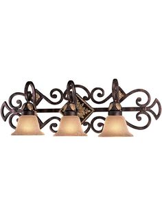 three light bathroom fixture with an ornate design and frosted glass shades on the bottom