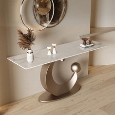 a modern console table with white marble top and metal base, in front of a circular mirror