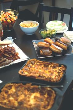 the table is full of different types of food