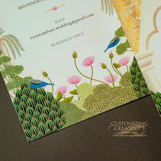 two wedding cards on top of each other with an image of birds and flowers in the background