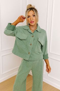 - This adorable top is the versatile piece you need in your wardrobe this season! - Soft, sage hued material with a ribbed texture - Collared neckline - Button down front - Two chest pockets - Long sleeves with buttoned cuffs - Relaxed silhouette that falls to a straight hemline Measurements S : Bust 42", Hip 40", Length 19.5", Sleeve Length 18", Waist 40". M : Bust 44", Hip 42", Length 20", Sleeve Length 18", Waist 42". L : Bust 46", Hip 44", Length 21.5", Sleeve Length 18.5", Waist 44".