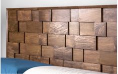 the headboard is made out of wood blocks