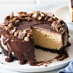 there is a chocolate cake on the plate with one slice cut out and ready to be eaten