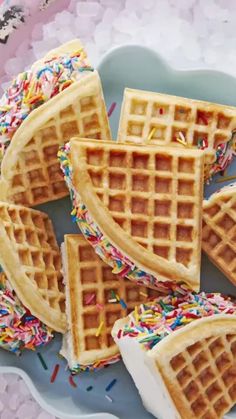 several waffles with sprinkles on a plate