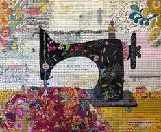 an old sewing machine sitting on top of a patchwork piece of fabric with flowers