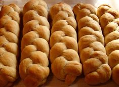 bread rolls lined up on top of each other