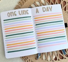 an open notebook with one line a day written on it