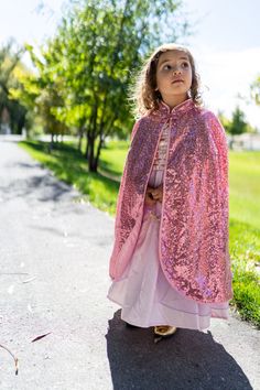 The right cloak can help finish the look and make any dress up more dazzling and this Gold Shimmer Cloak is sure to help you complete the look! Ages 3-8 Made from a shimmering pink sequin fabric and lined with a pink china silk Quality hook and loop closure, easy on - easy off Breathable, Silky Soft, 100% Polyester Fabrics Dress Ups & Accessories Sold Separately Pink Sparkly Sequin Dress For Dress-up, Pink Glitter Sequin Dress For Dress-up, Pink Sequin Dress For Dress-up, Pink China, Gold Shimmer, Sequin Fabric, Pink Sequin, Hook And Loop, Cloak