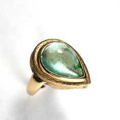 High Quality New Cocktail Gold Ring Unique Polished Emerald Ring For Formal Occasions, Timeless Teardrop Ring For Formal Occasions, Formal Teardrop Bezel Setting Rings, Elegant Recycled Gold Rings For Formal Occasions, Elegant Formal Rings In Recycled Gold, Modern Pear-shaped Rings As Gift, Elegant Teardrop Bezel Set Ring, Classic Teardrop Emerald Ring For Formal Occasions, Luxury Teardrop Emerald Ring For Gift