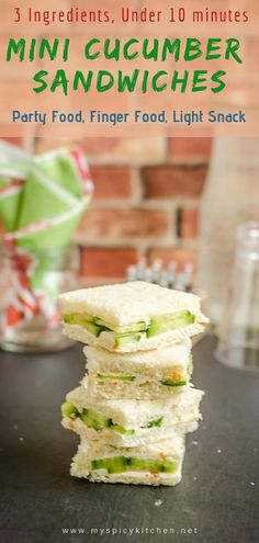 mini cucumber sandwiches stacked on top of each other