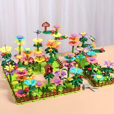 a bunch of flowers that are sitting on a table