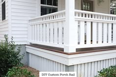 a white porch rail on the side of a house