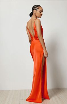 The Gaia Dress, crafted from a luxe satin, showcases a plunging deep V neckline at both front and back. The floor length gown features a sexy thigh high side split and elegant soft mermaid skirt. The vibrant tangelo colour is the perfect go to for any event. Floor Length Gown, Mermaid Skirt, Glam Dresses, Fashion Event, Shades Of Orange, Side Split, Fashion Pictures, Thigh High, Formal Wear