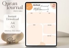 an instant digital file is displayed next to a rock with the words quaran journal printed on it