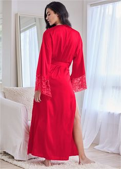 Long sleeves and long hemline assure this robe gives you ample coverage before romantic evenings in and flirty breakfasts in bed! Lace adds allure to the wide sleeve openings and the tie belt around the waist is shape-defining. This glamorous robe is just as flirty as anything it conceals underneath!  * Sizes: S (4-6), M (8-10), L (12-14), XL (16)  * Plus sizes: 1X (18-20), 2X (22-24), 3X (26-28)  * Tie belt at waist  * Lace trim at long sleeve openings  * Poly/spandex. Imported Swim Trends, Fall Denim, Red Long Sleeve, Work Wear Women, One Piece Suit, Online Fashion Store, Long Sleeve Maxi, Online Fashion Stores, Fashion Sale