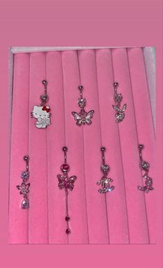 hello kitty charms are in a pink box